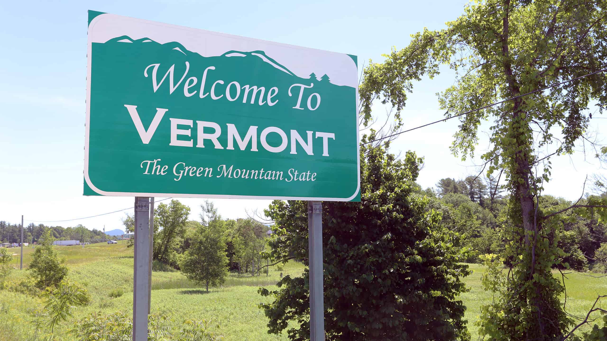 A welcome sign at the Vermont state line.