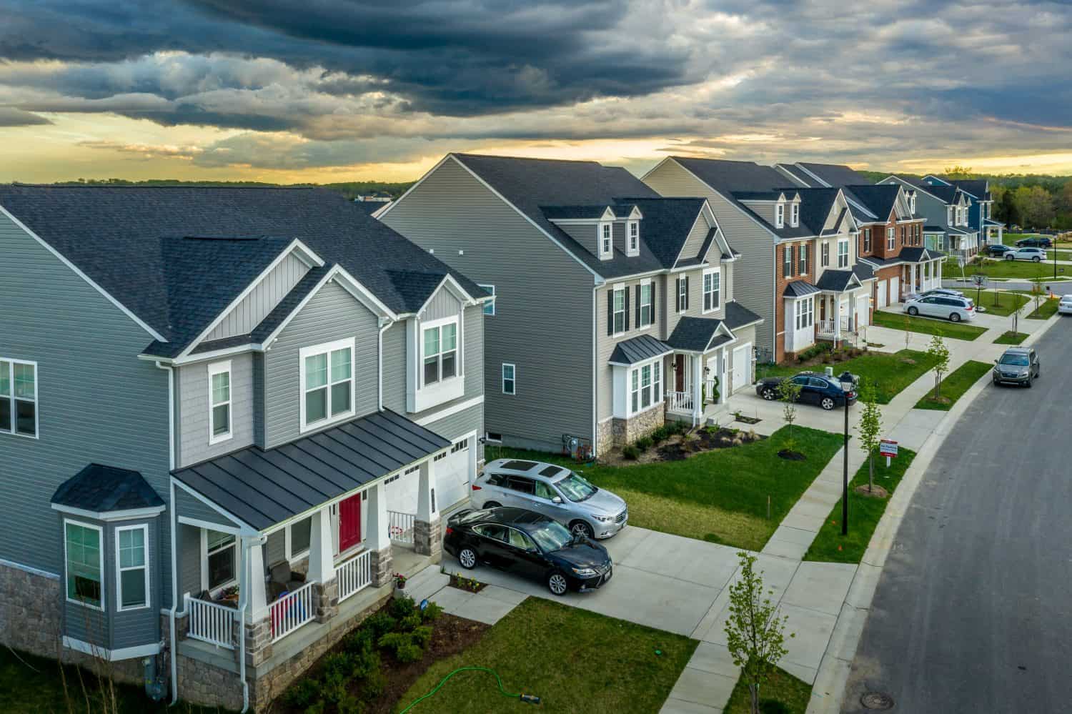 Aerial view of typical American new construction neighborhood street in Maryland for the upper middle class, single family homes USA real estate