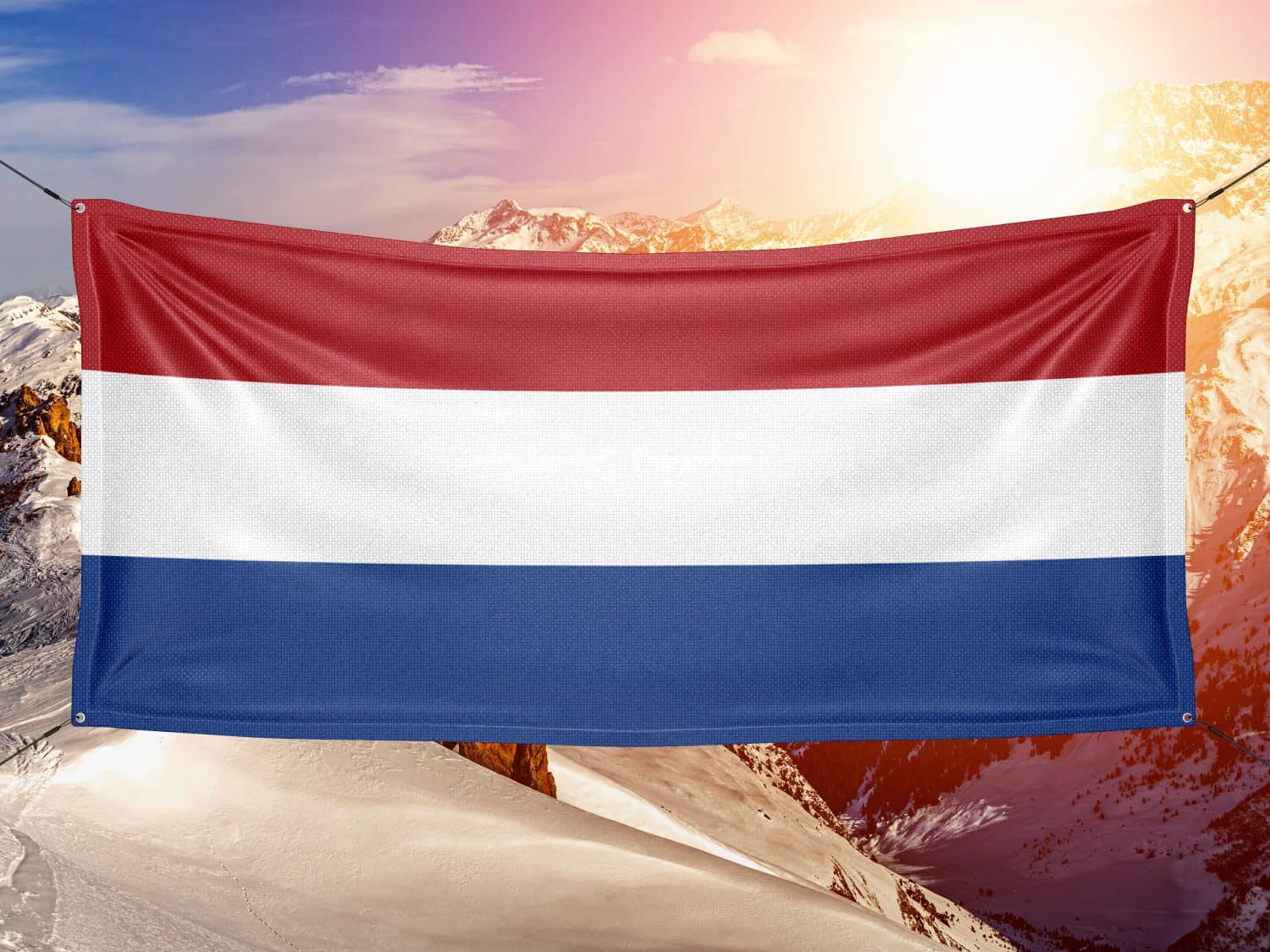 Netherlands national flag cloth fabric waving on beautiful background.