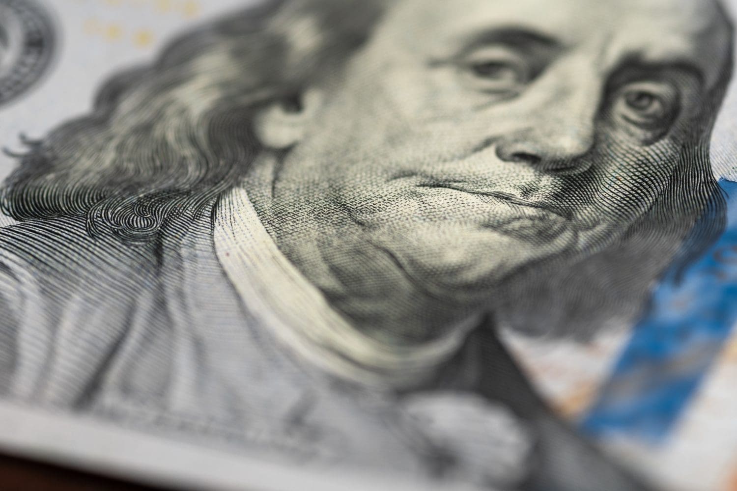 Benjamin Franklin's face on a new hundred dollar bill. macro shot usa dollar banknote or bill. Close-up