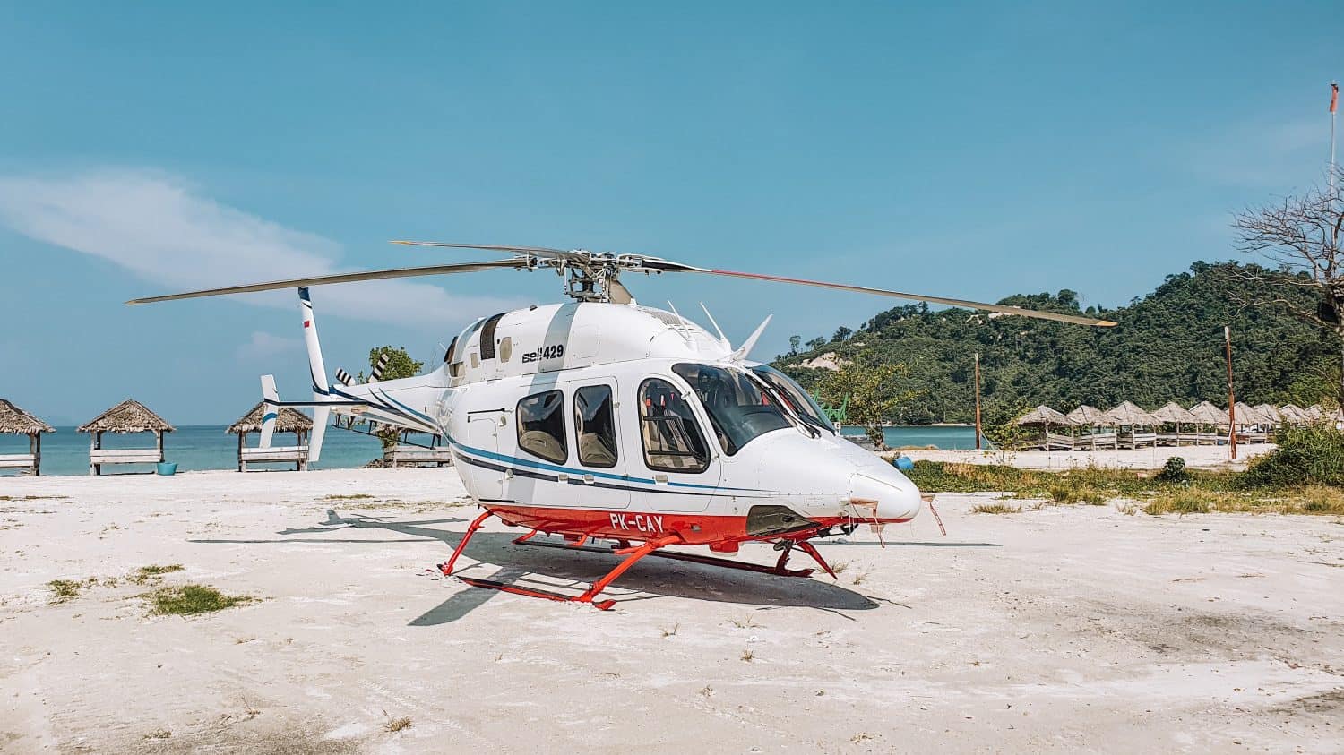 Bell 429 helicopter land on an island of Tegal Mas with registration of PK-CAY.