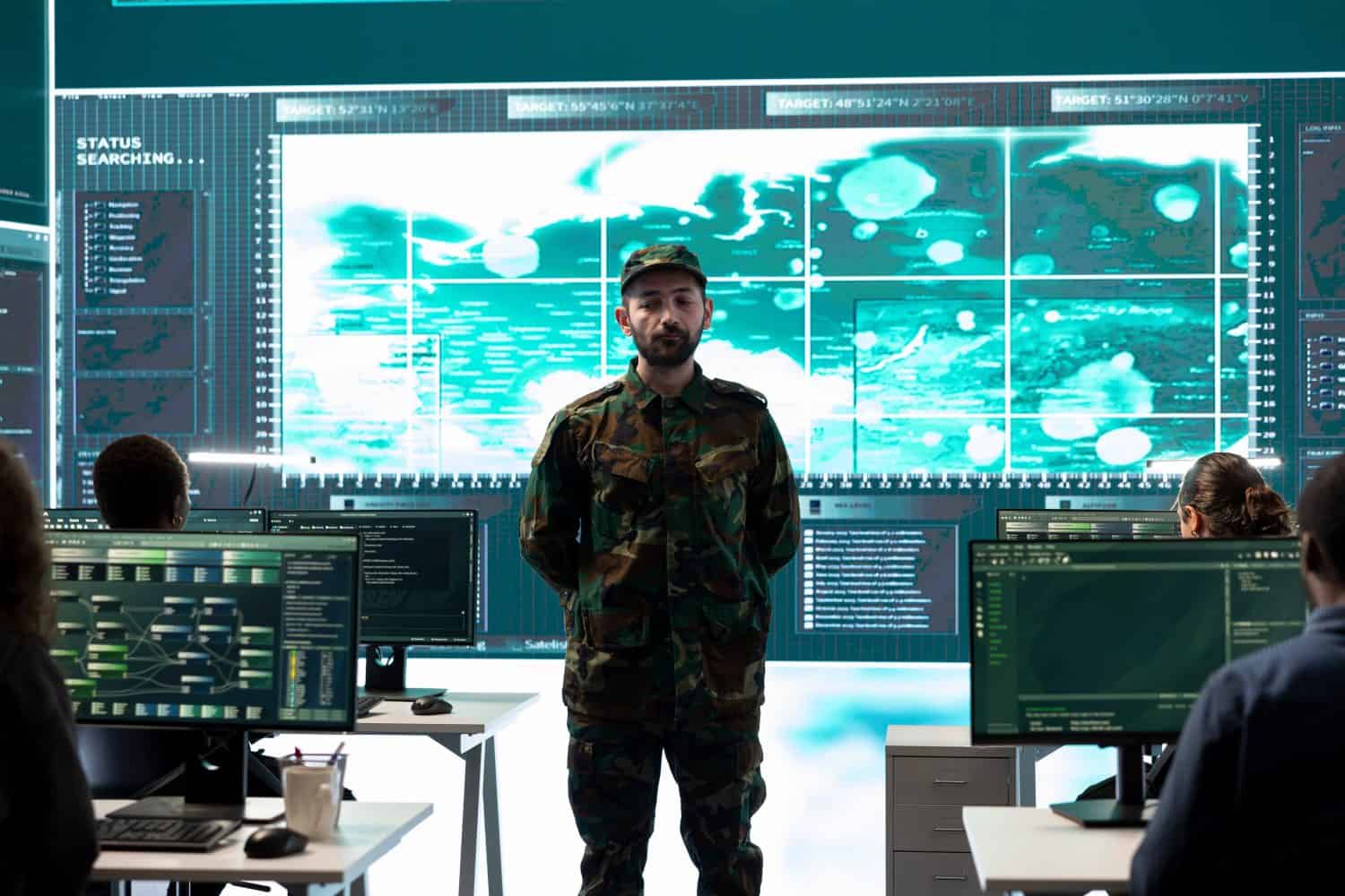 Military personnel working in a government cyber defense center, cyber attack prevention. Soldiers team securing sensitive data from spyware, ransomware and other malware threats.