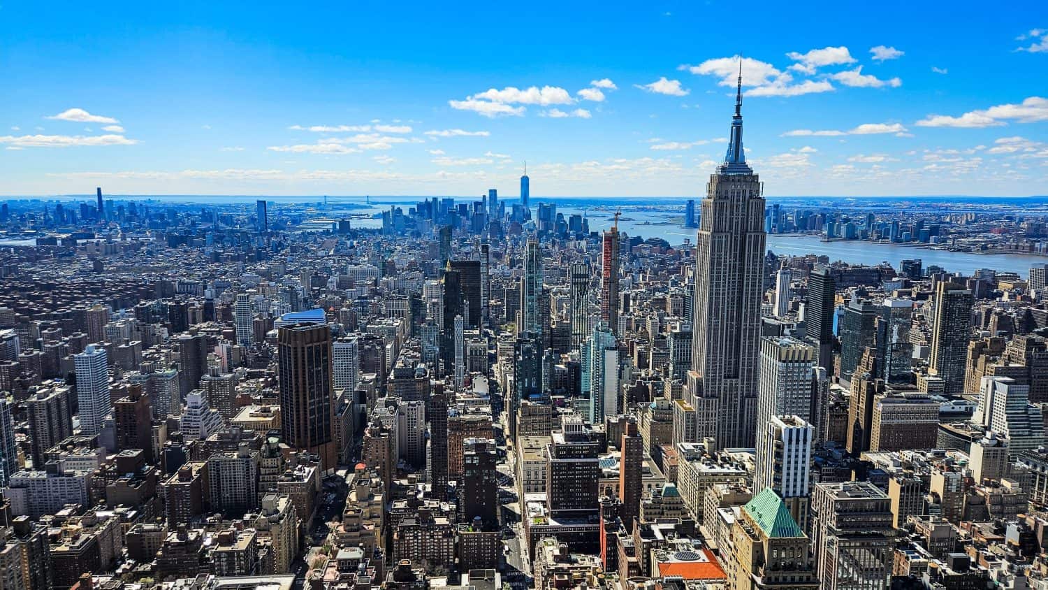 View from Summit observatory over Manhattan and the Empire State Building in New York City, USA.