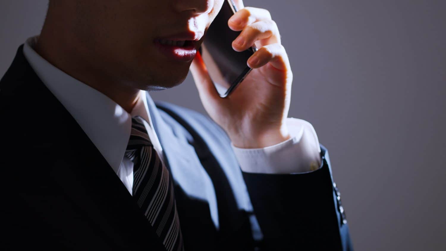 Businessman on a black background