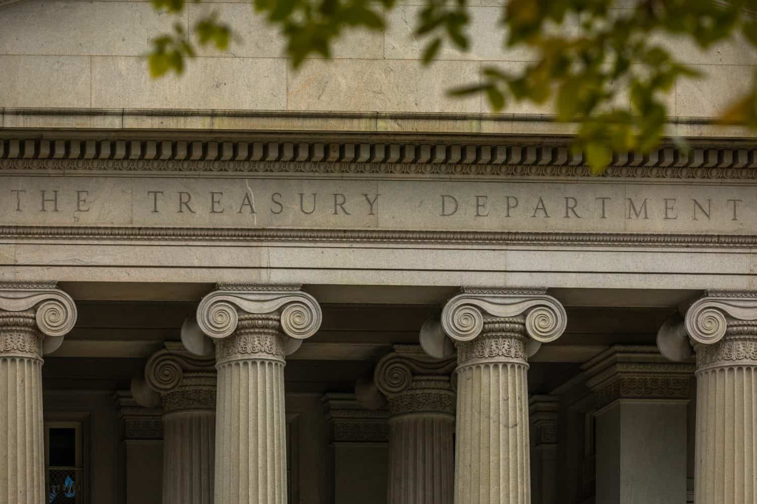 Lettering &quot;The Treasury Department&quot; on the Facade of the United States Treasury Department Building in Washington, DC - USA