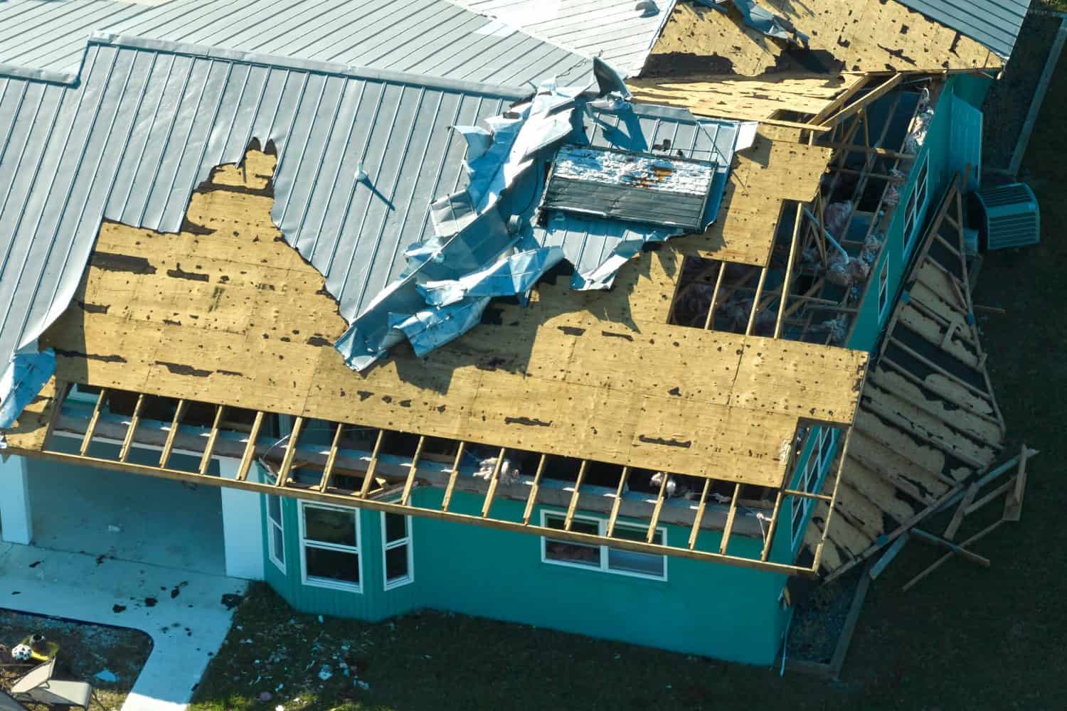 Hurricane Ian destroyed house in Florida residential area. Natural disaster and its consequences