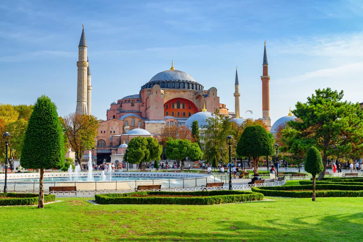 Fountain at Sultanahmet Square and the Hagia Sophia in Istanbul, Turkey. The Sultanahmet Square is a popular tourist attraction of Istanbul.