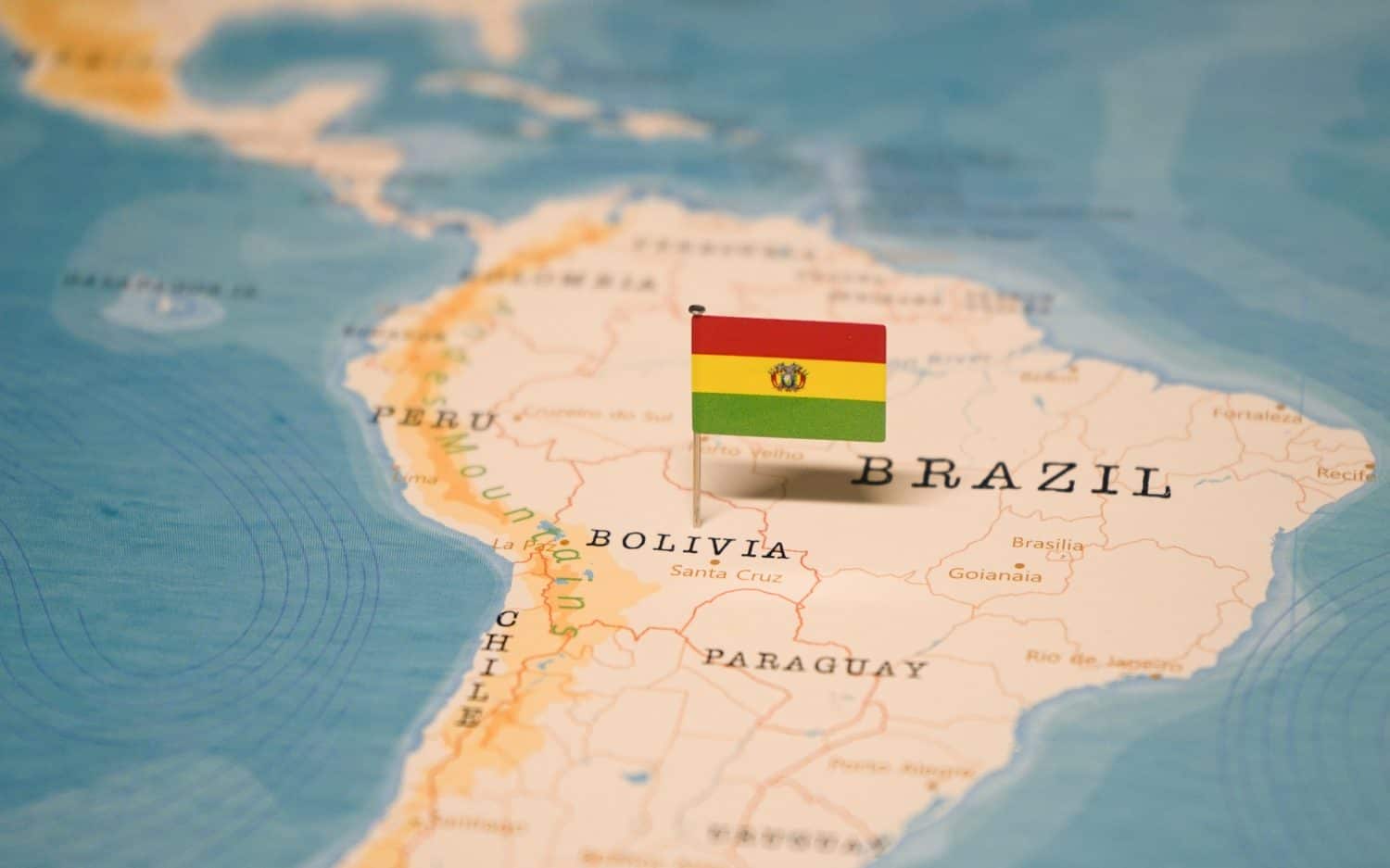 The Flag of Bolivia on the World Map.