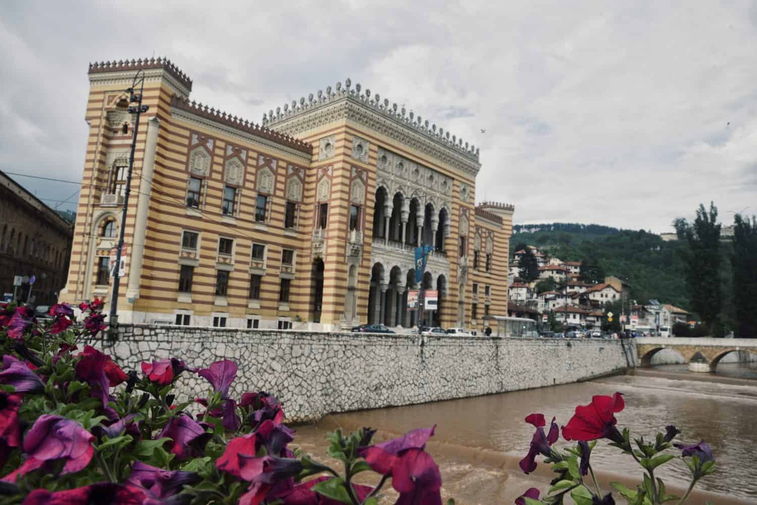 Vijećnica City Hall of Sarajevo, Miljacka River and Šeher-Ćehajina ćuprija bridge in Bosnia and Herzegovina