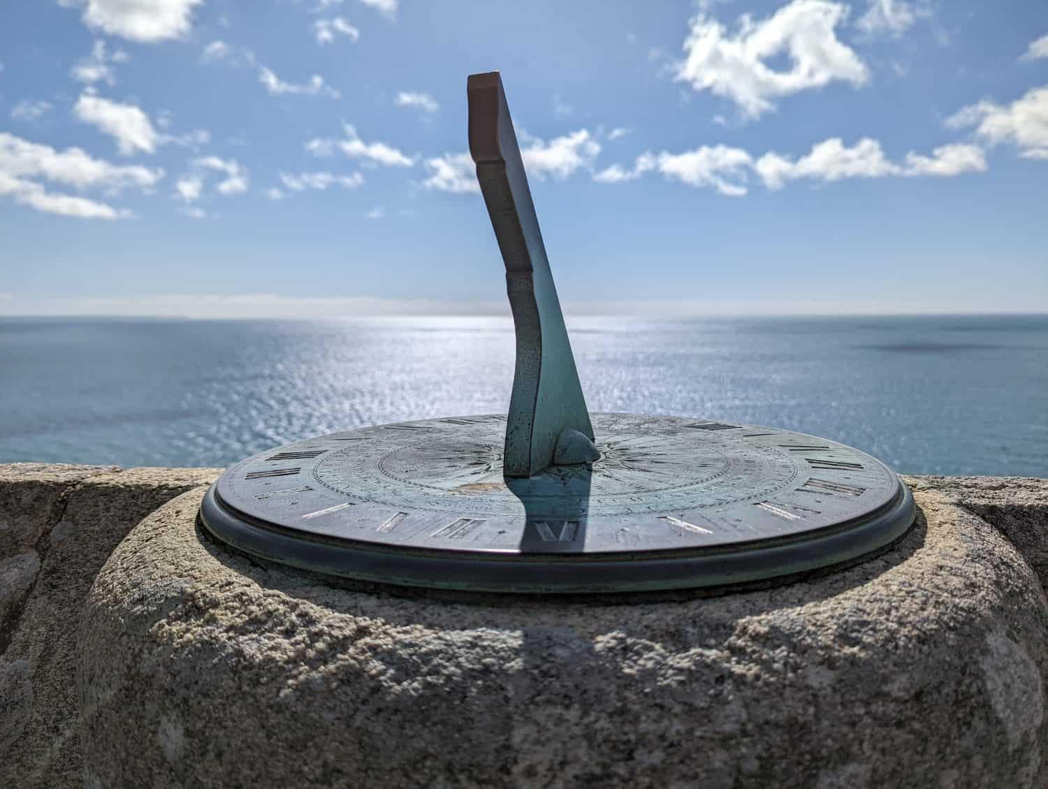 A sun dial by the sea