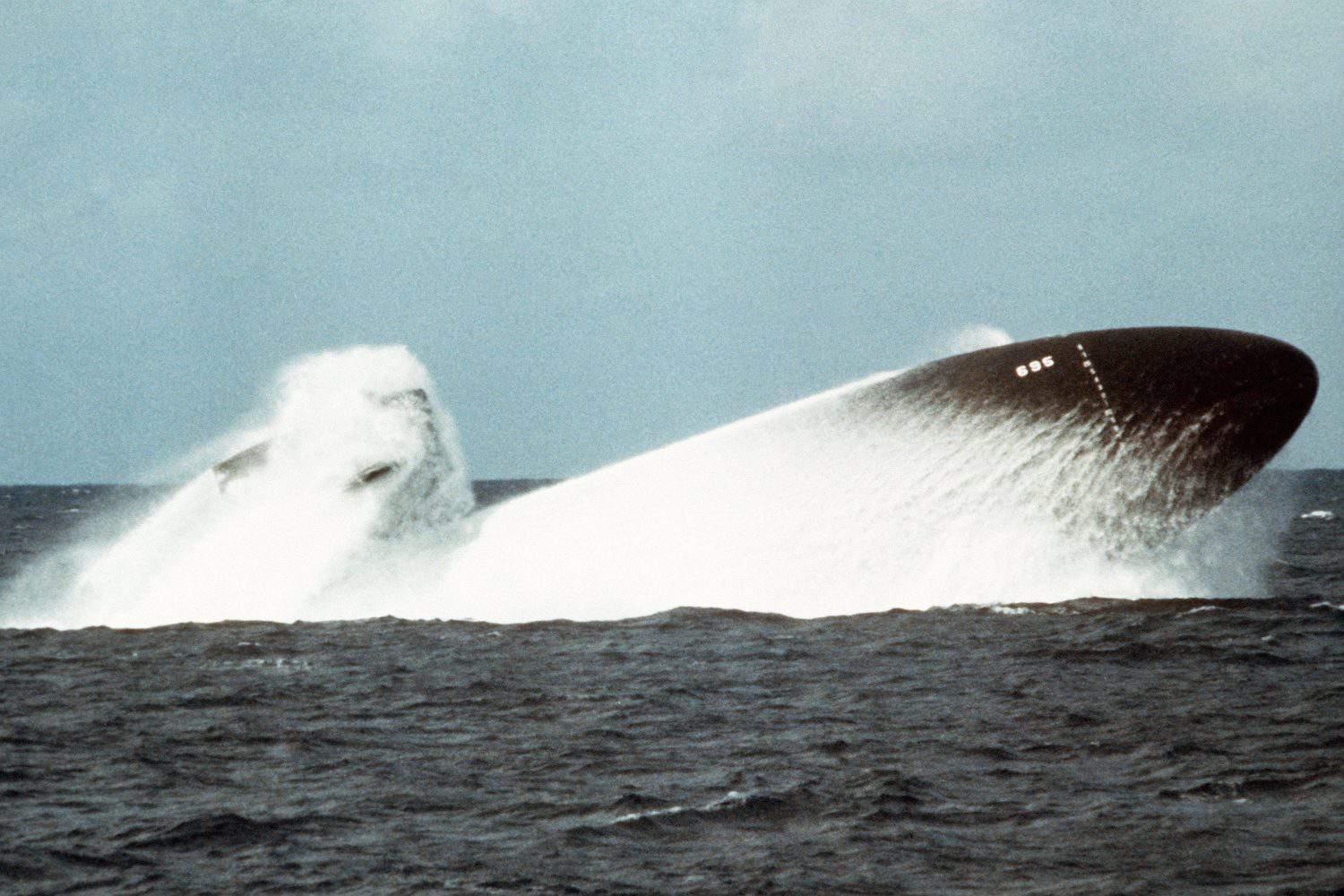 The nuclear-powered attack submarine BIRMINGHAM conducting an emergency surfacing exercise during sea trials. Nov. 19 1978.