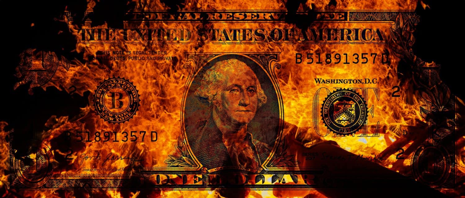 1 US dollar banknote in flame for design purpose