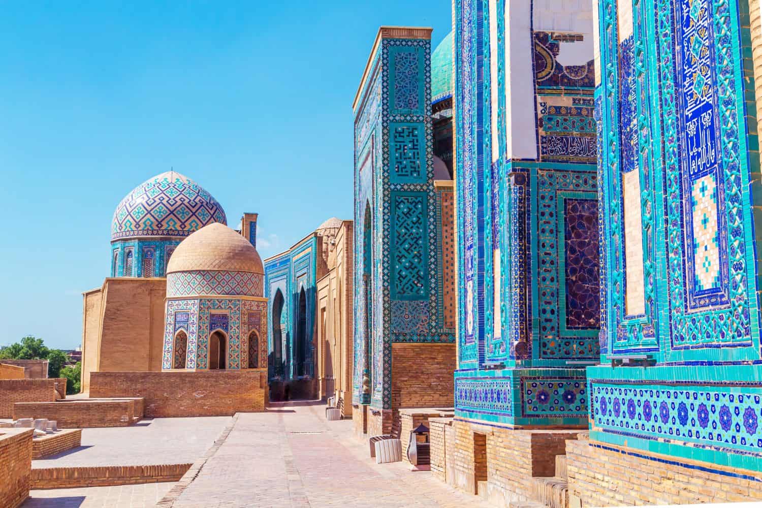 The ensemble of mausoleums Shahi-Zinda. Decorated with turquoise and blue tiles with floral patterns. UNESCO World Heritage Site. Samarkand, Uzbekistan - July 20, 2024