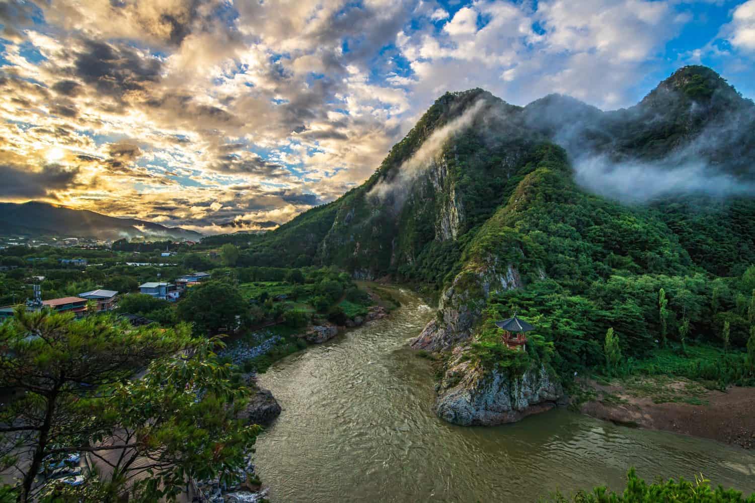 South Korea&#039;s natural landscape on Wollyu Bong Mountain in the morning, a landmark of North Chungcheong Province, rich in natural resources, with streams and ancient wooden pavilions covered with fore