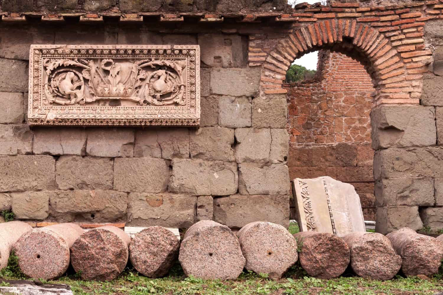 Remains of Roman ruins entrance to a small house with ornamentation and decorations of the period near the Vatican, Rome