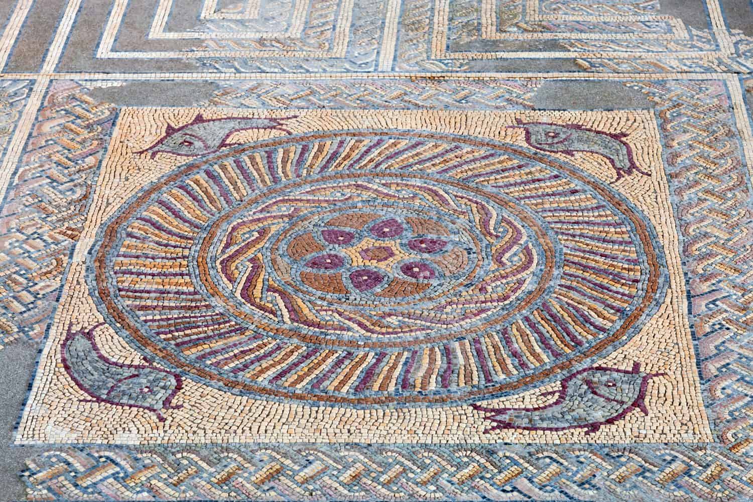 Close-up of a decorative Roman tessera mosaic pavement in the peristyle of the House of Fountains. Conimbriga in Portugal, is one of the best preserved Roman cities on the west of the empire.