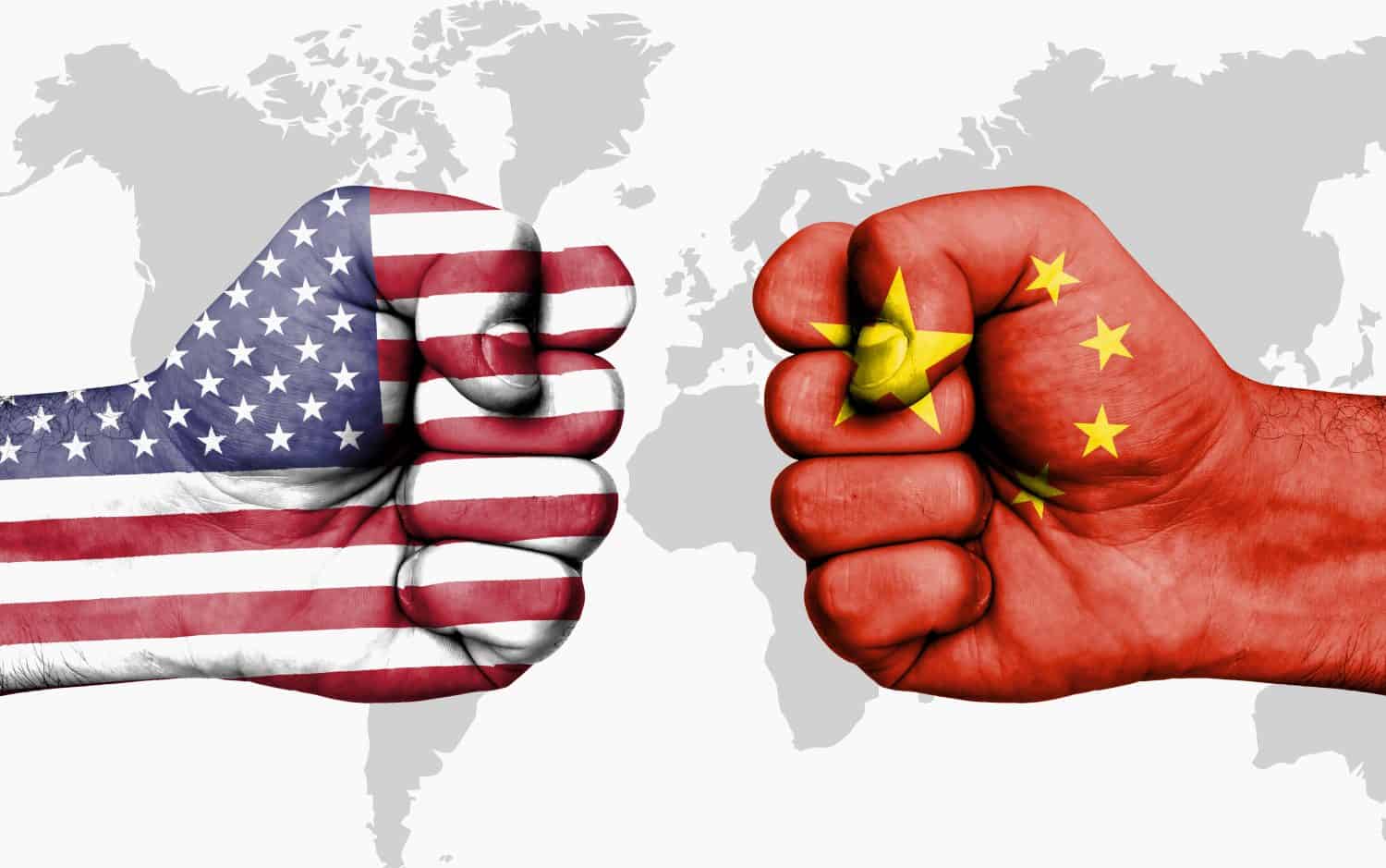 Conflict between USA and China, male fists - governments conflict concept