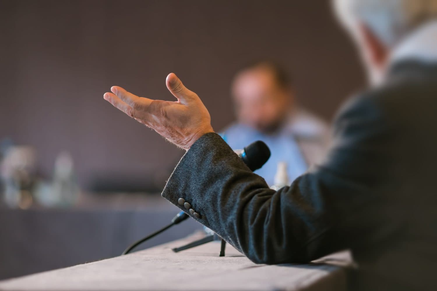 people debating at seminar presentation