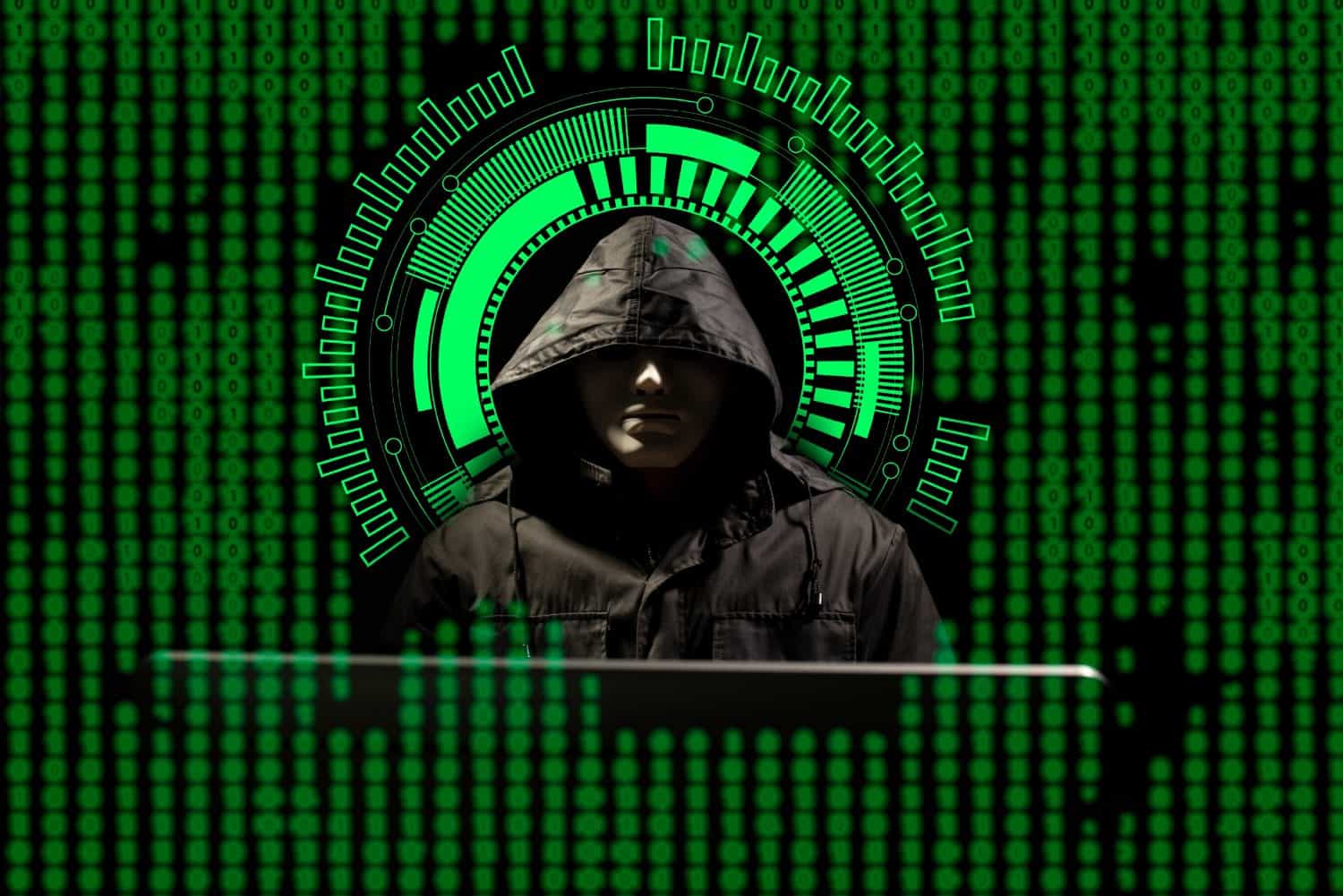 The hacker Obscured dark face in mask and hood. Data thief, internet attack, darknet fraud, dangerous viruses and cyber security.