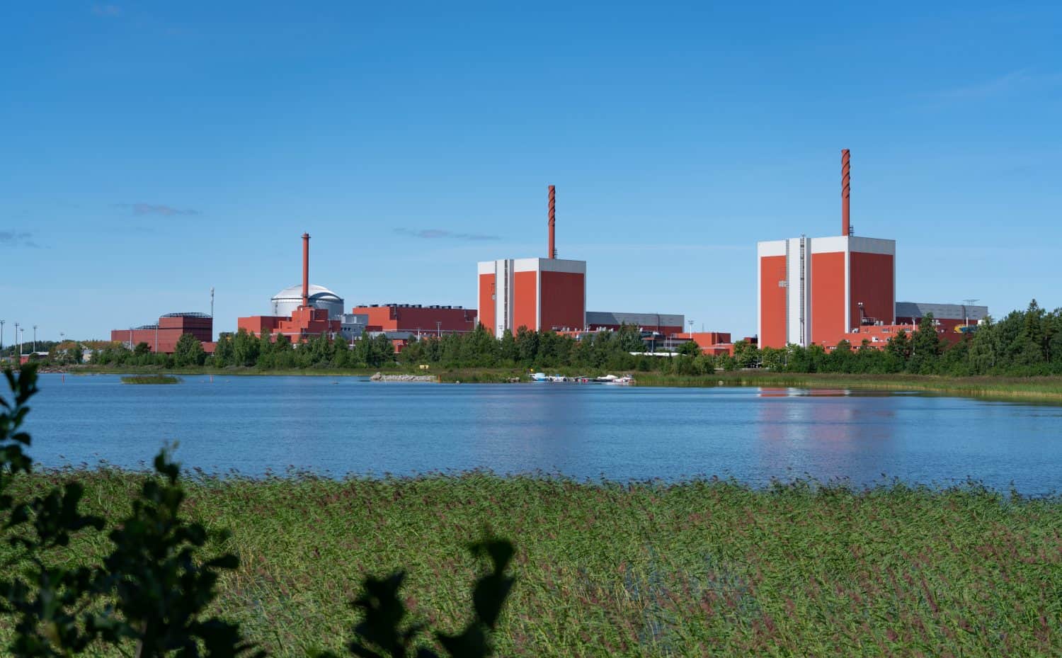 Olkiluoto nuclear power plant located near Rauma Finland. Sunny summer day. View from the woods near the Olkiluoto visitor centre. Clean energy production