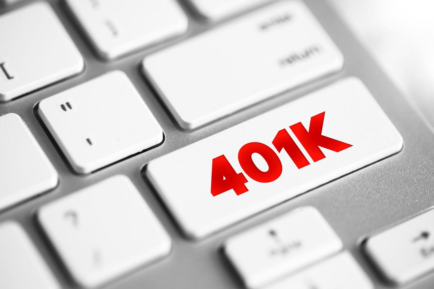 401K - retirement savings and investing plan that employers offer, text concept button on keyboard