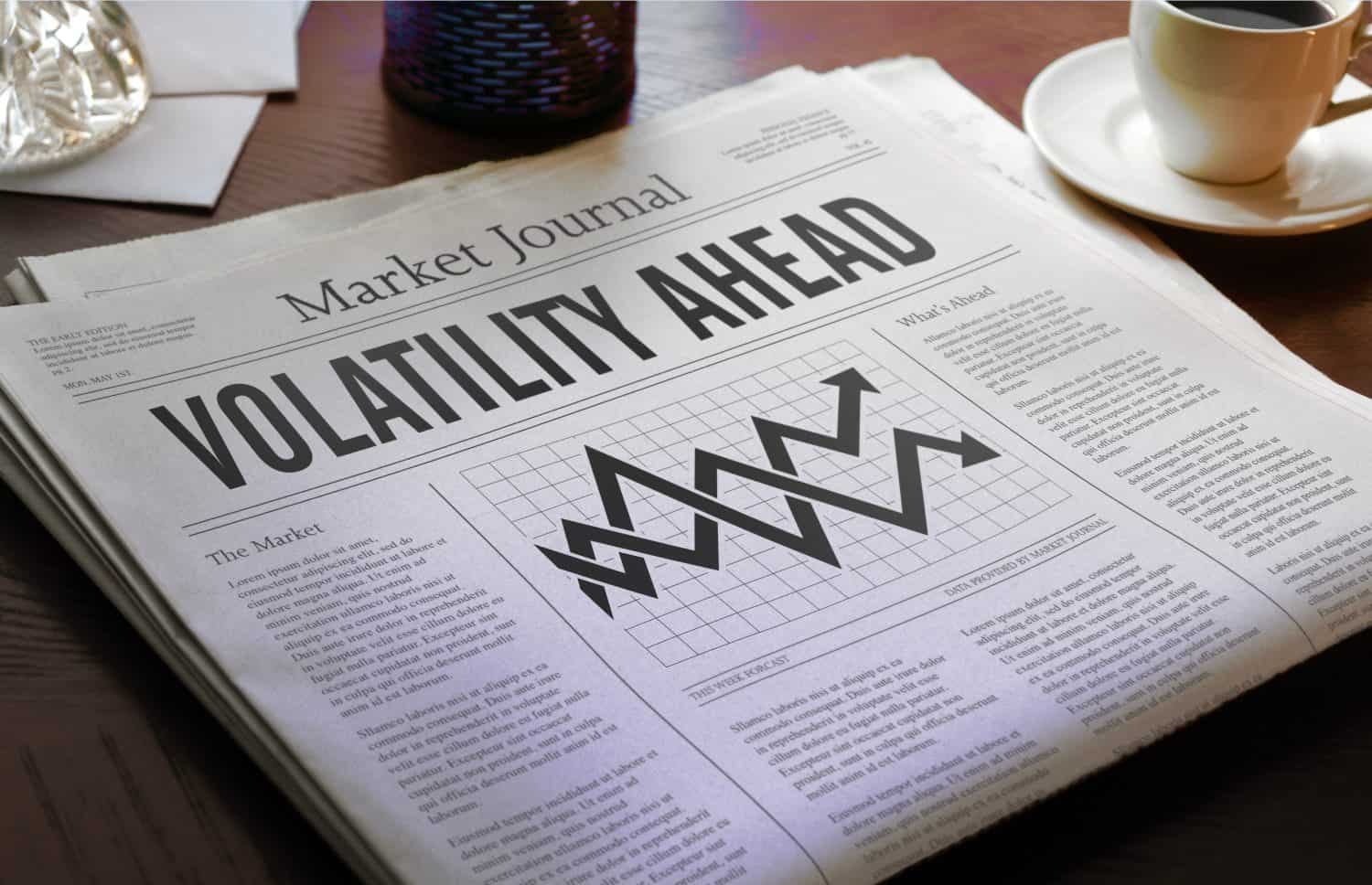 Volatility stock market ahead headline newspaper on desk