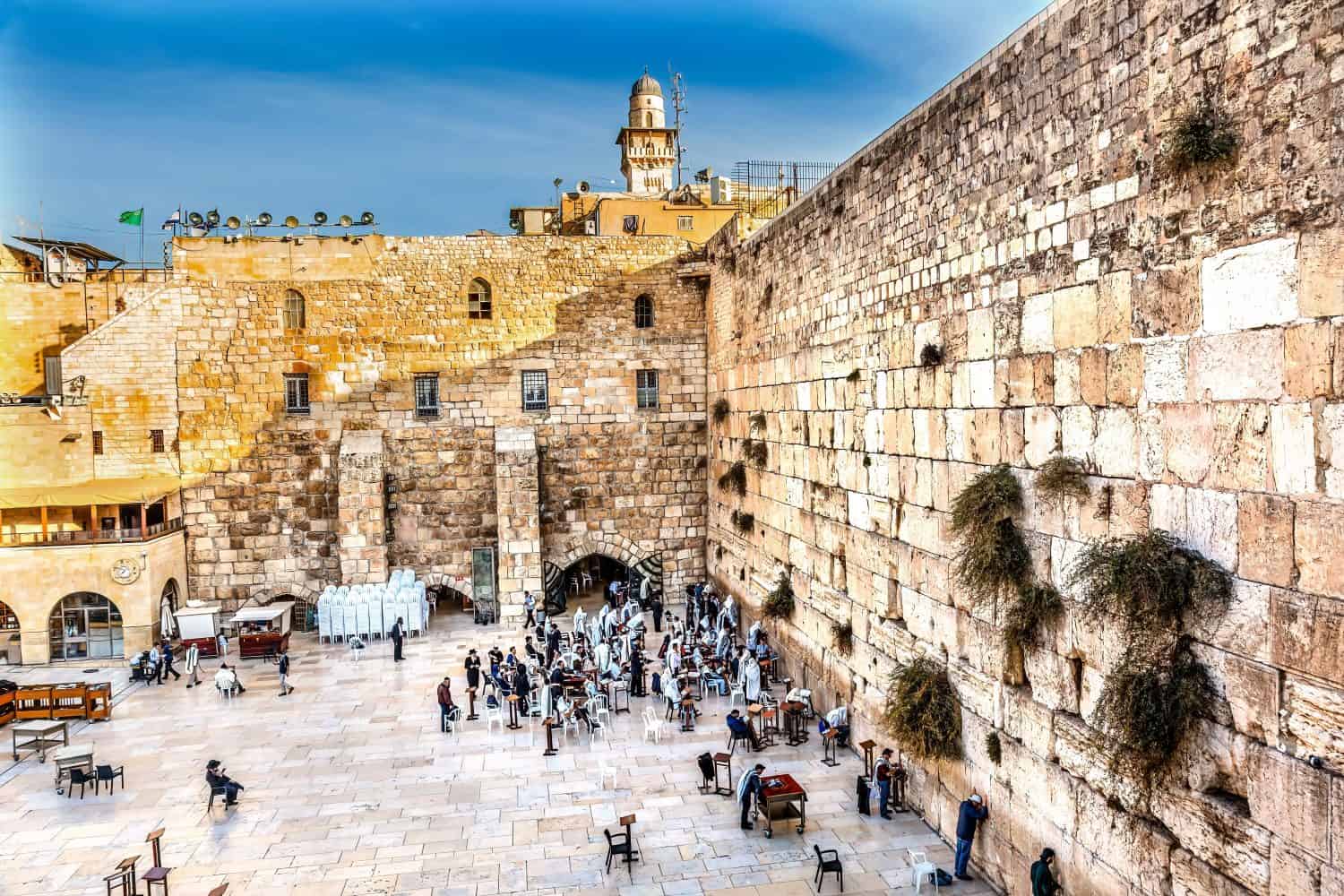 Praying at the Western&quot;Wailing&quot; Wall of Ancient Temple Jerusalem Israel. Western wall of Ancient Jewish Temple built in 100BC on Temple Mount. Judaisim&#039;s most holy site