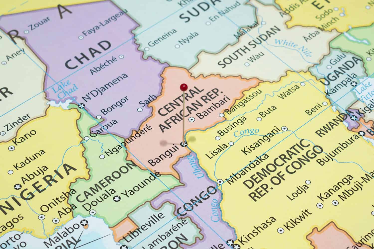 Close up to a Bangui city with a red pin needle into Central African Republic country political map