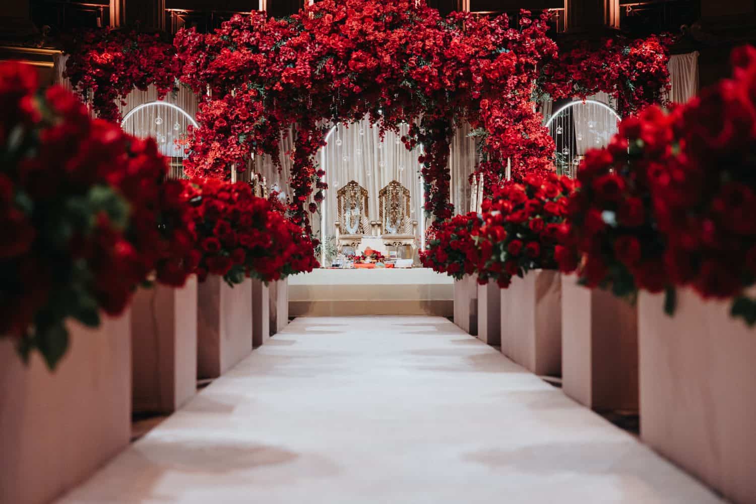 Luxurious wedding interior Wedding stage, interior design, roses for decoration, red is the main color