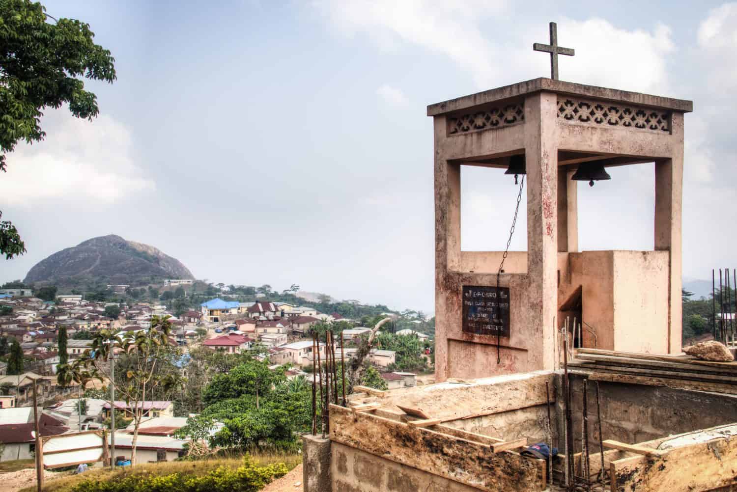 View from the church over the town of Amedzofe with its green surroundings and the mountain in the background in the Volta Region, Ghana