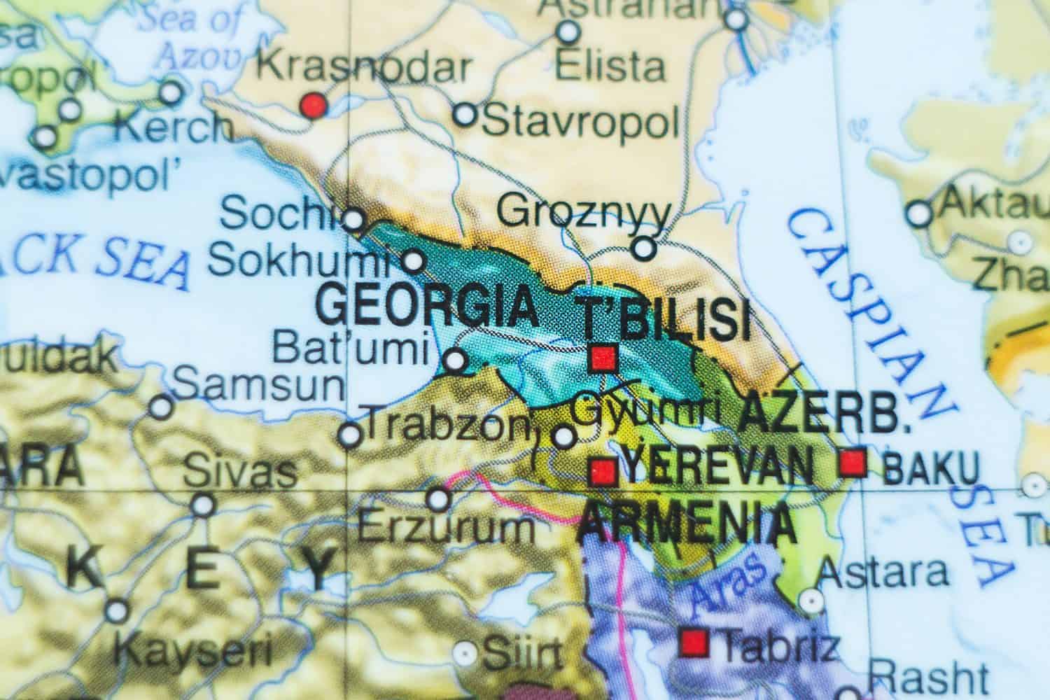 Photo of a map of Georgia and the capital Tbilisi .