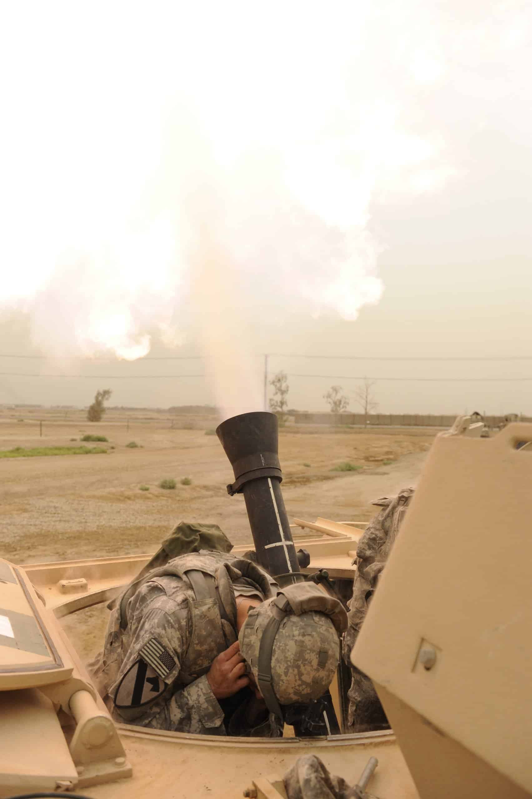 April 25, 2009 - U.S. soldiers fire the M120 Mortar system out of a M113 Armored Personal Carrier on Forward Operating Base Taji, Baghdad, Iraq.
