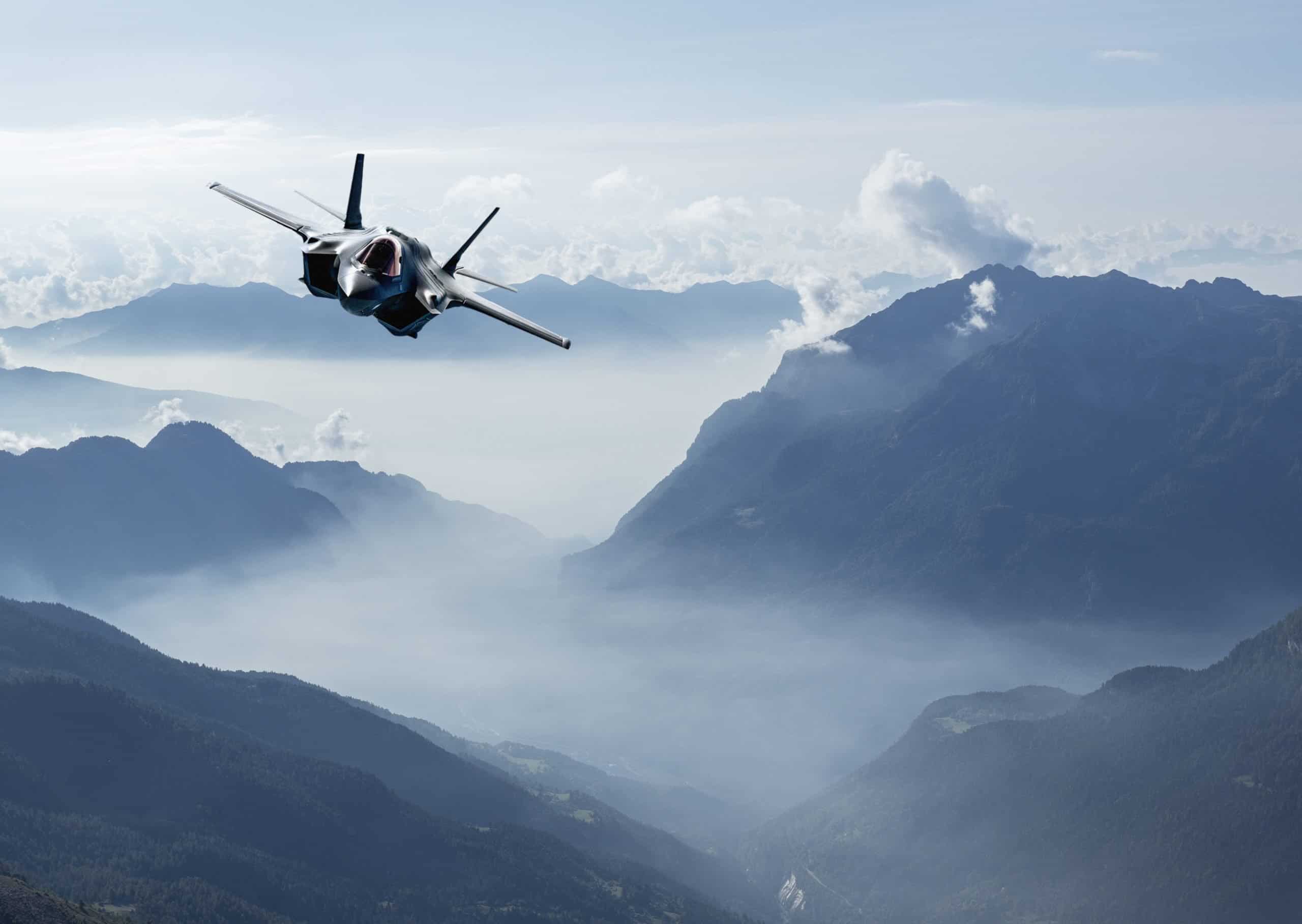 F-35 Army Fighter jet flying over mountains