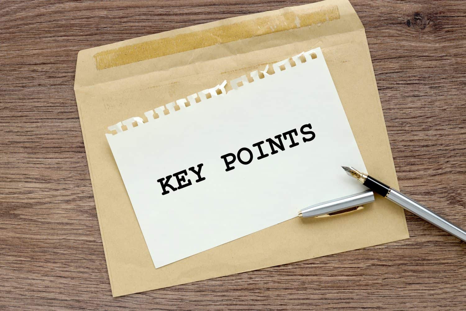 KEY POINTS text on a white paper envelope