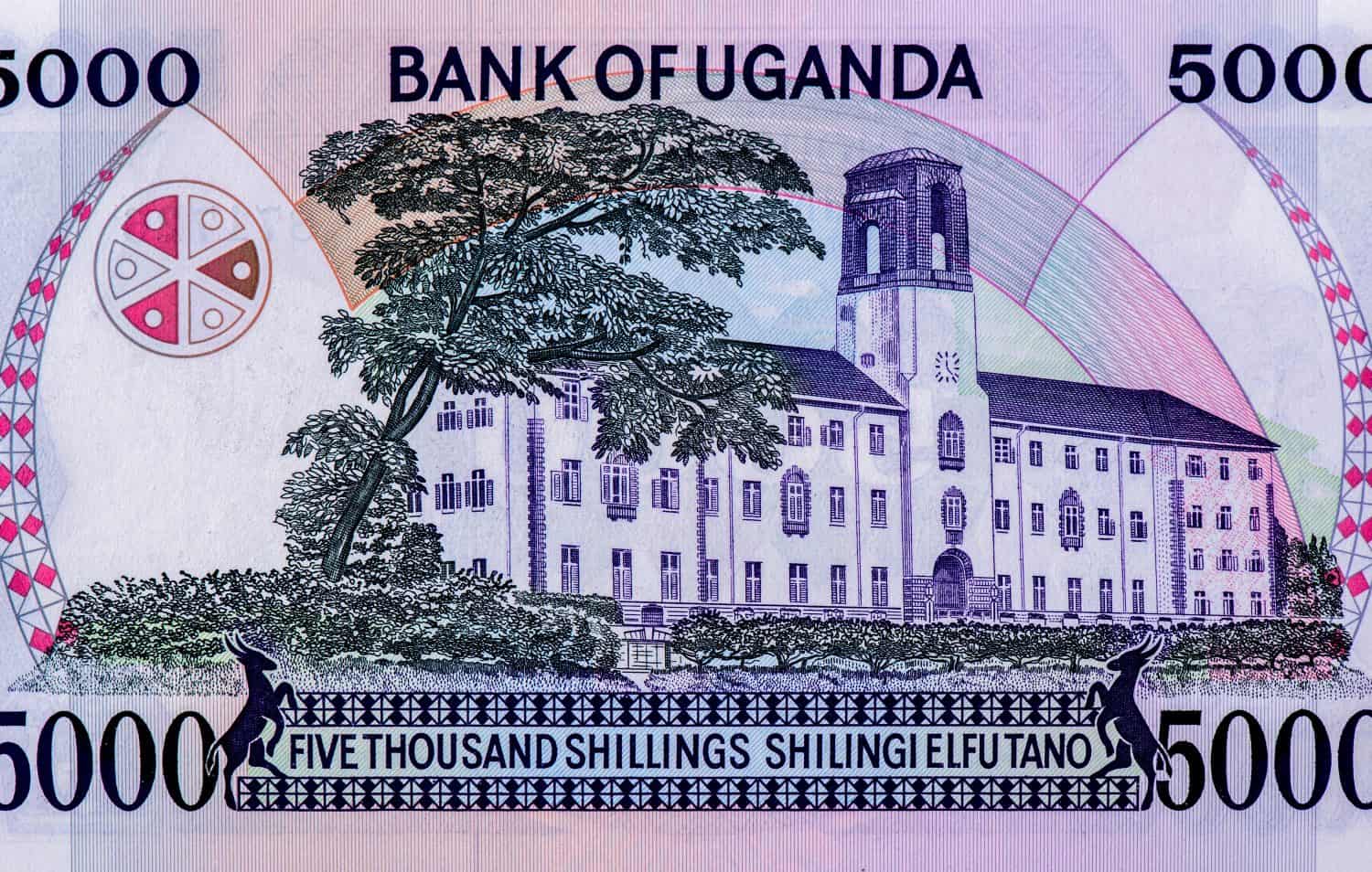 Central building clock tower Makerere University, Portrait from Uganda 5000 Shillings 1985 Banknotes.