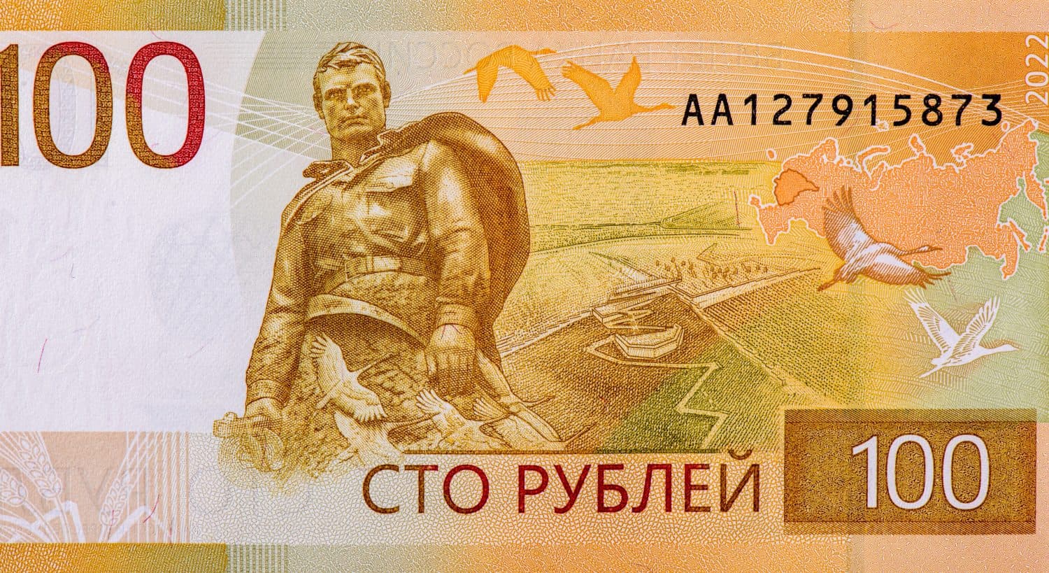 Rzhev Memorial to the Soviet Soldier in Tver Oblast, Portrait from Russia 100 Roubles 2022 Banknotes.