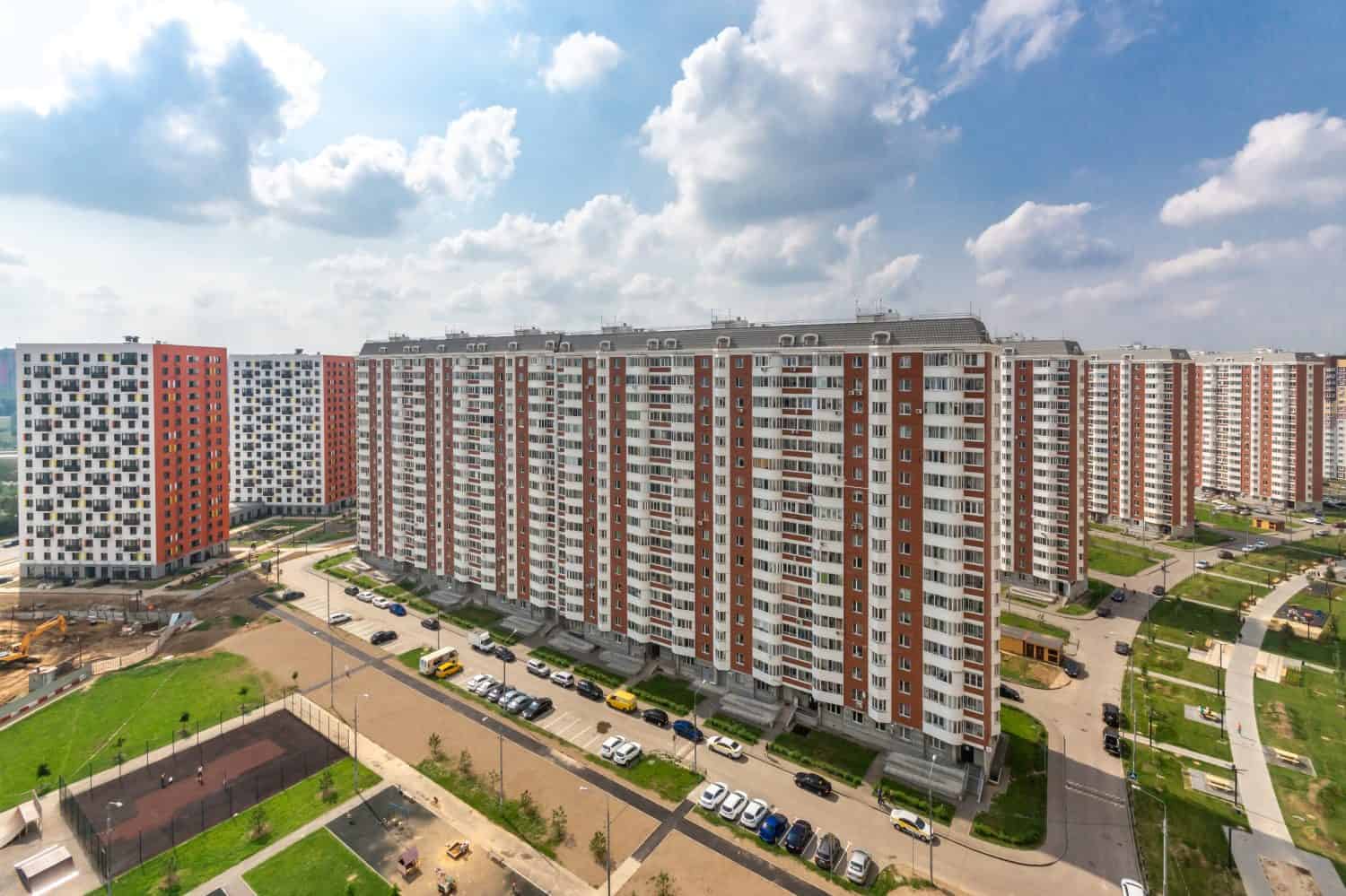 Magnificent panoramic view of the new Butovo district with modern multi-storey buildings on a clear summer day.