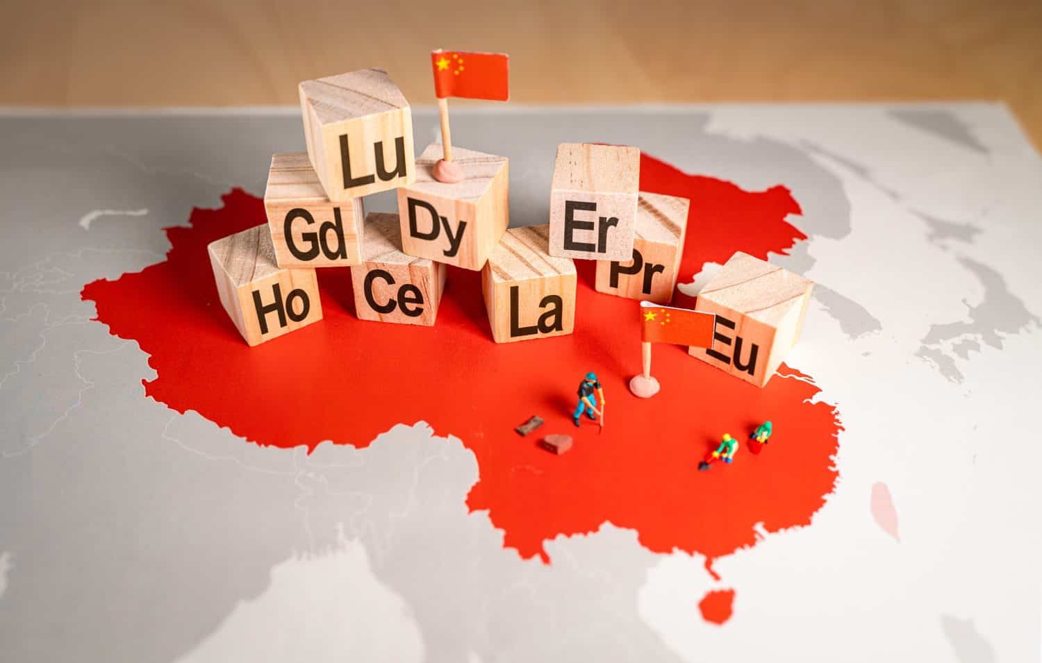 Rare earth elements over a map of China. China is the dominant global supplier of rare earths, 17 minerals that are indispensable to the manufacturing of smartphones, electric vehicles, military