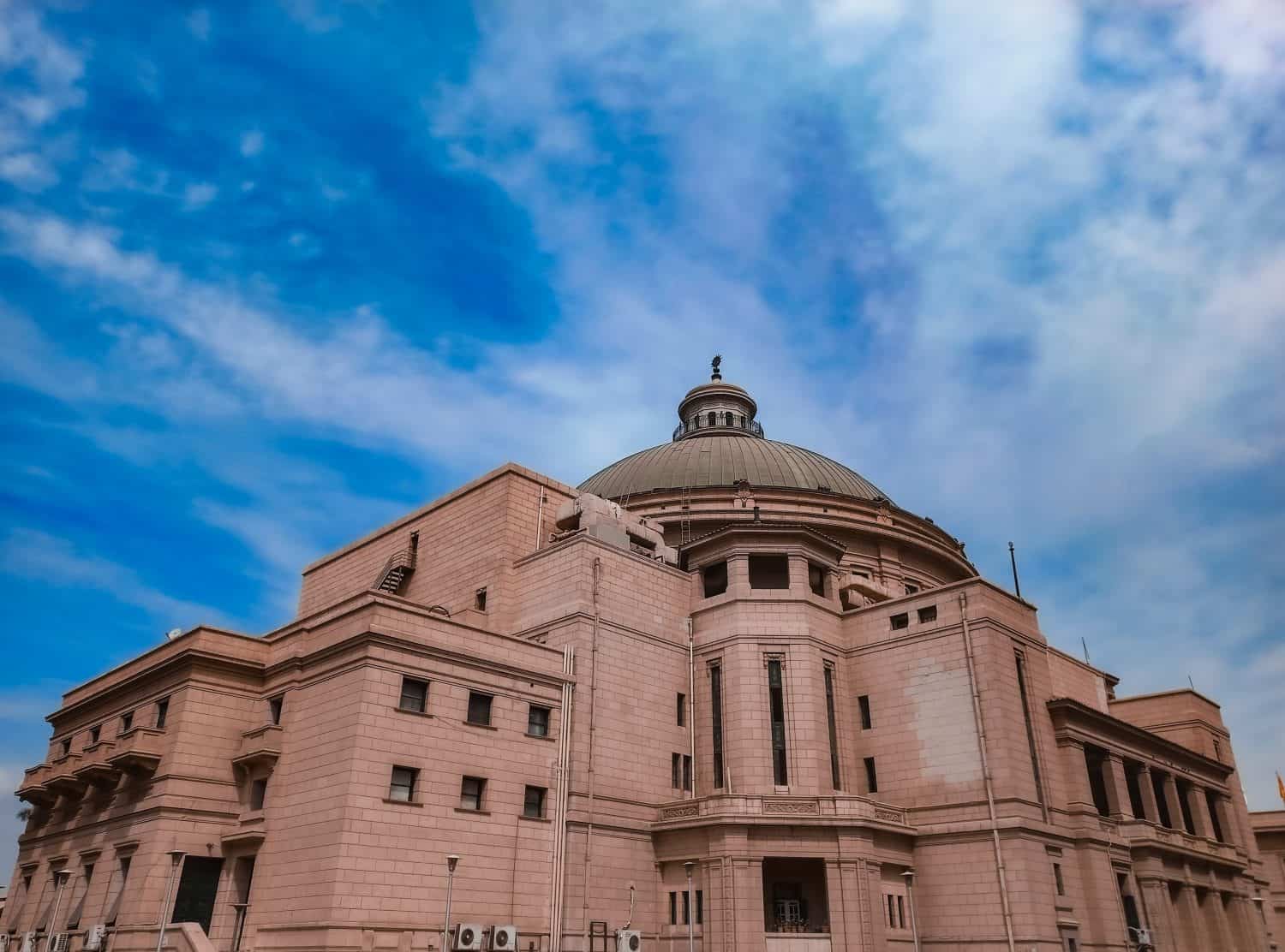 The dome at Cairo University with blue sky