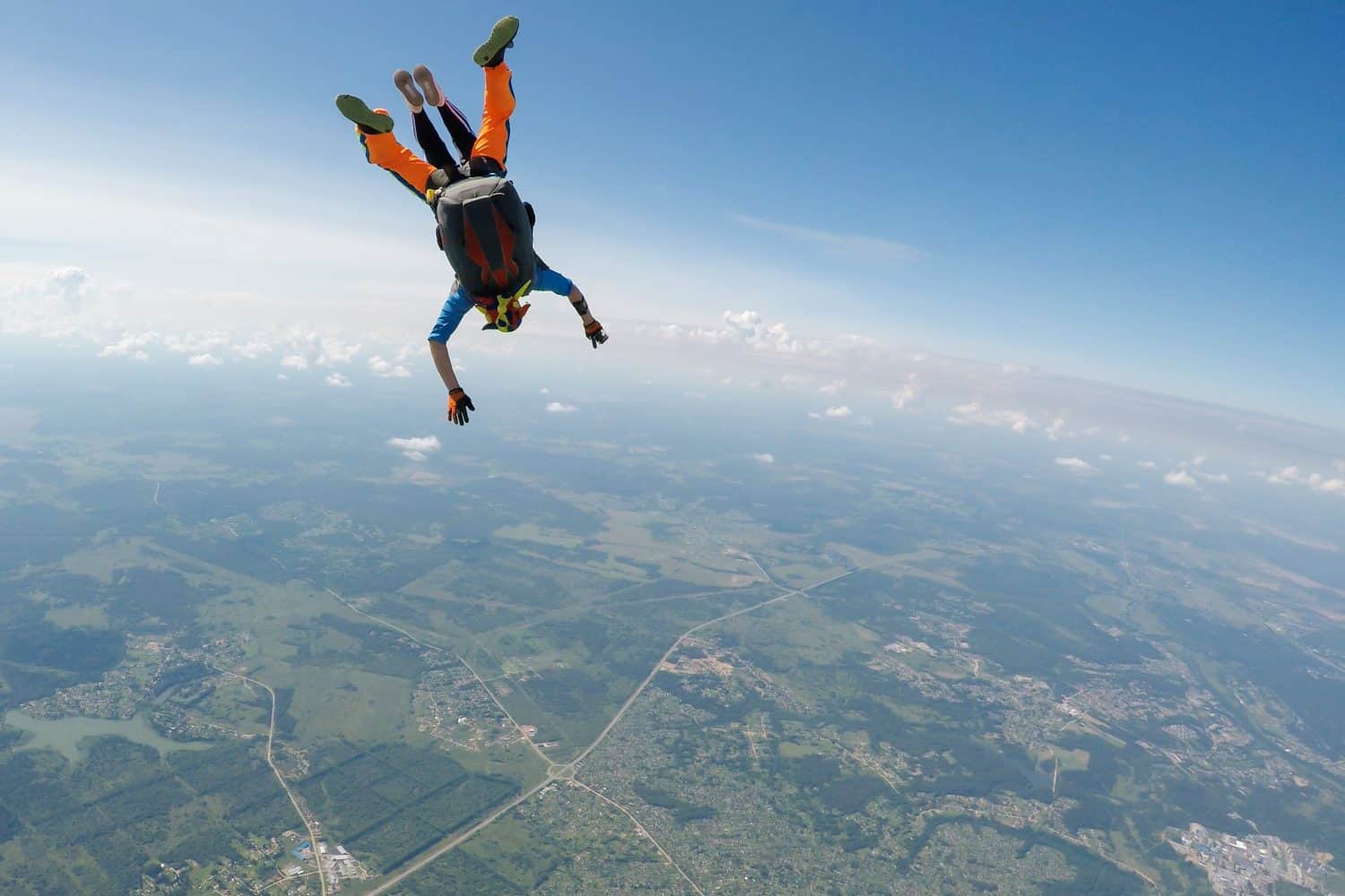 Skydiving tandem in a free fall with copy space