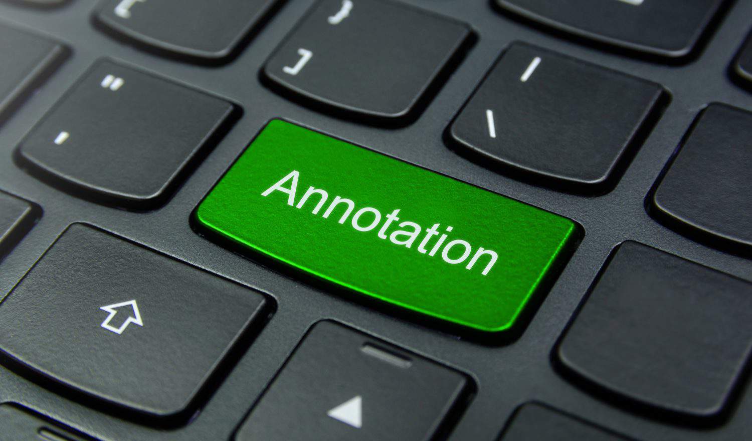 Business Concept: Close-up the Annotation button on the keyboard and have Lime, Green color button isolate black keyboard