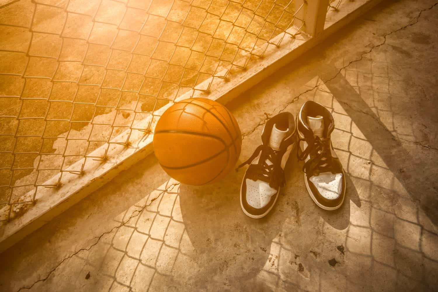 Basketball court with ball and shoes