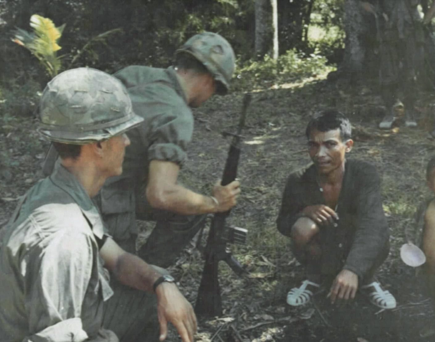 vietnamese man questioned by us soldiers, vietnam war