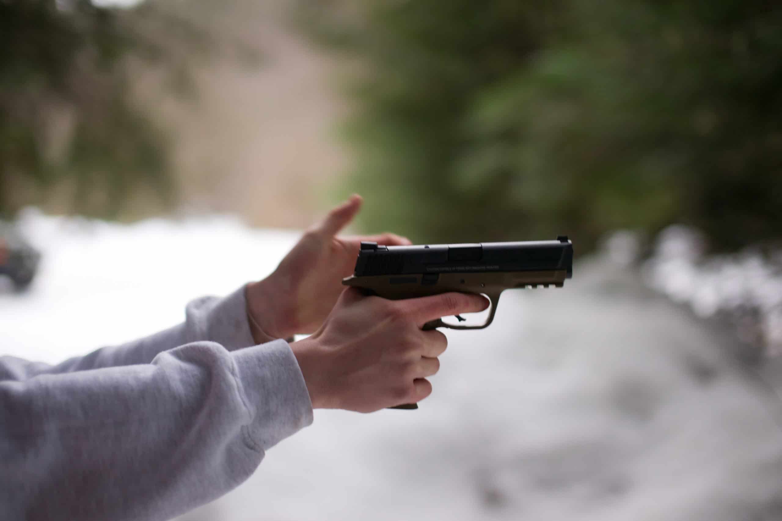 Man Aiming Handgun, Profile