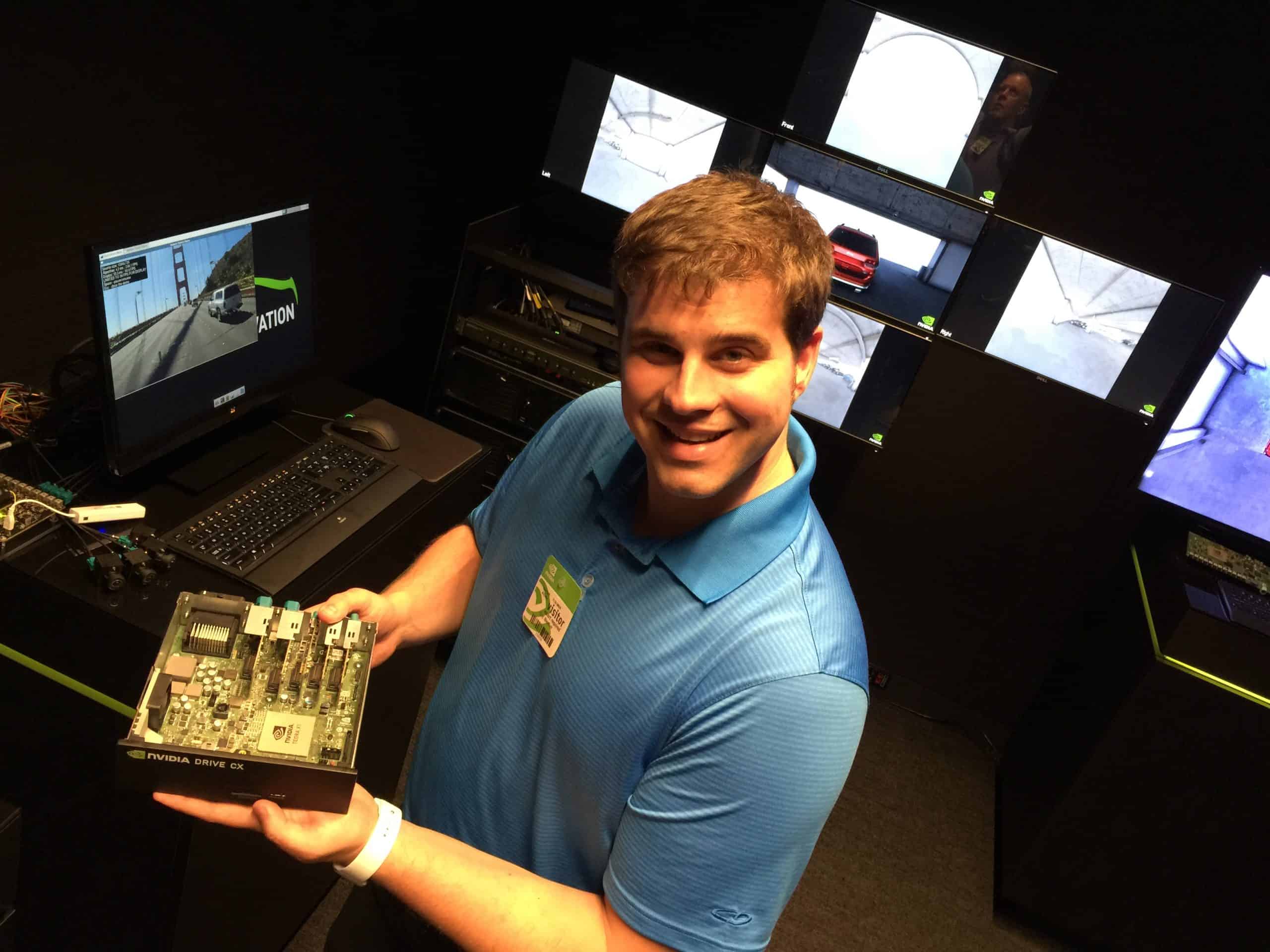 Eric Bleeker Holding a Self-Driving Chip at NVIDIA&#039;s Headquarters