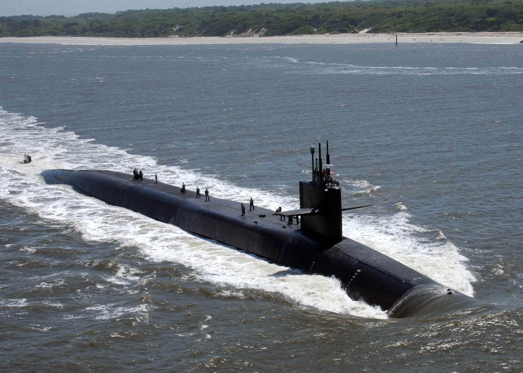 The Ohio-class guided missile submarine USS Florida (SSGN 728) makes her way through Cumberland Sound to Naval Submarine Base Kings Bay.