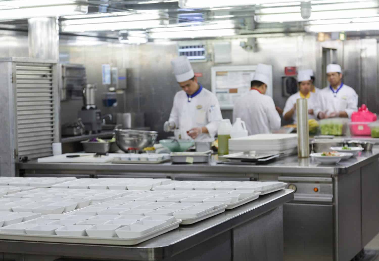 MIAMI, FLORIDA - December 21, 2015: Kitchen staff on cruise ships, including chefs and cooks, work some of the hardest and longest hours as the kitchens are in operation 24 hours a day.