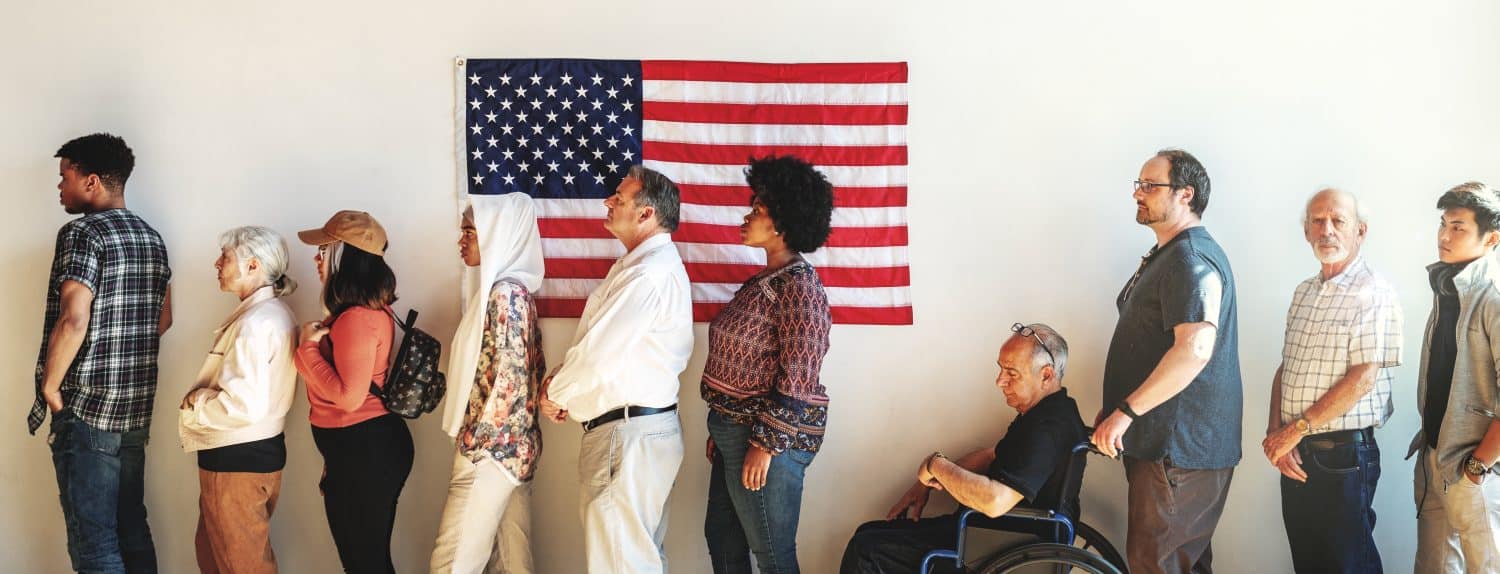 US election day, Diverse people wait in line to vote at US election station with American flag in background. Diverse people wait in line to vote at US election day. Vote for American democracy.