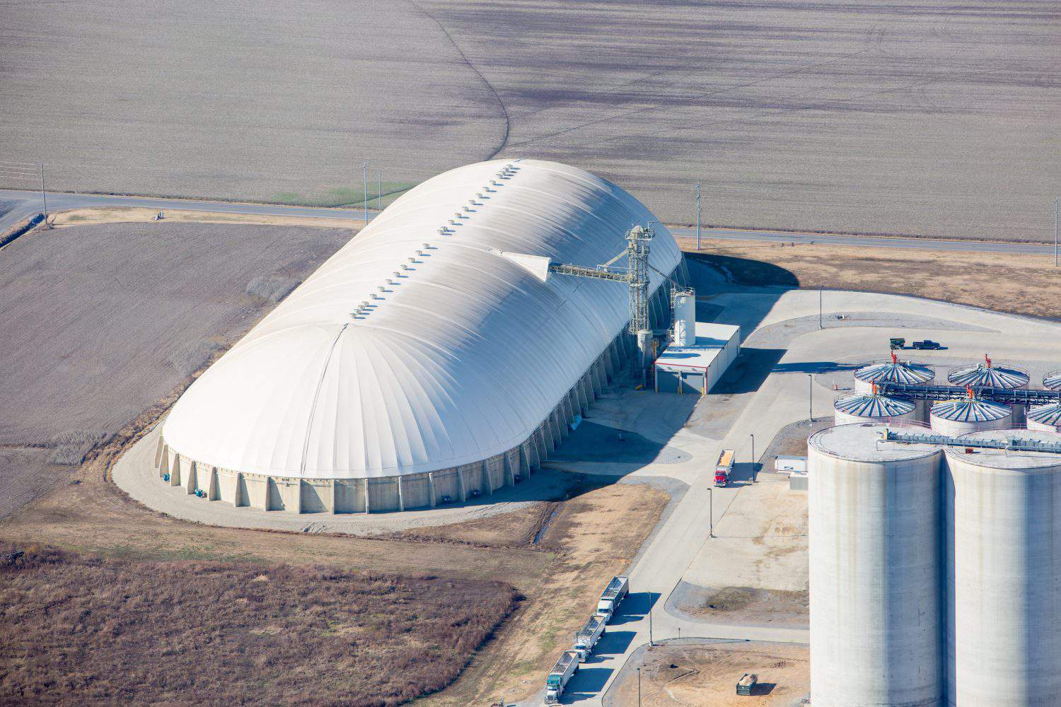 Aerial view of grain storage building adjacent to an ethanol production plant near Obion, Tennessee, USA