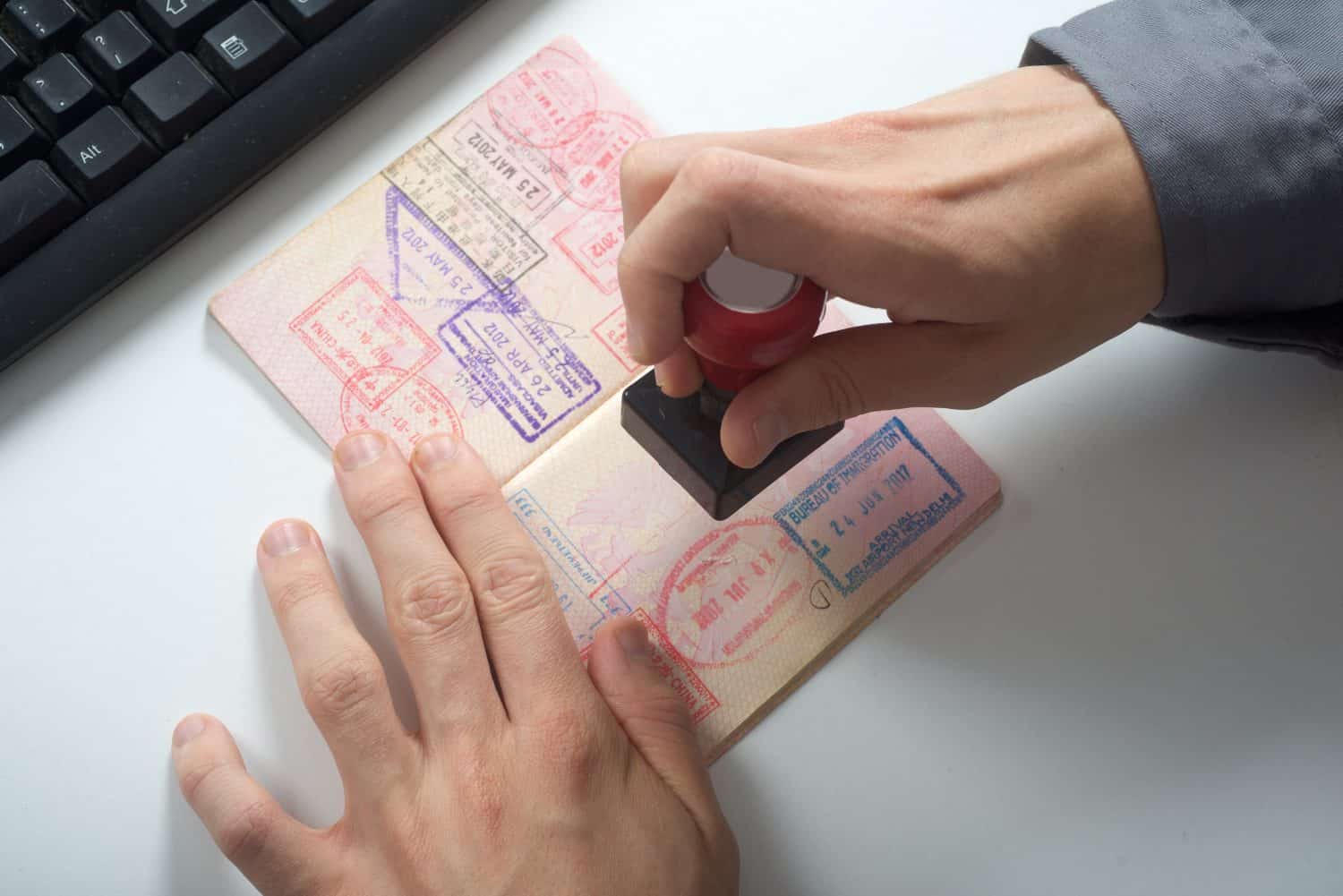 Immigration control officer will arrival stamp in the passport